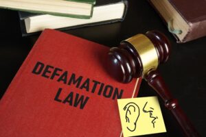 Defamation law is illustrated through text.